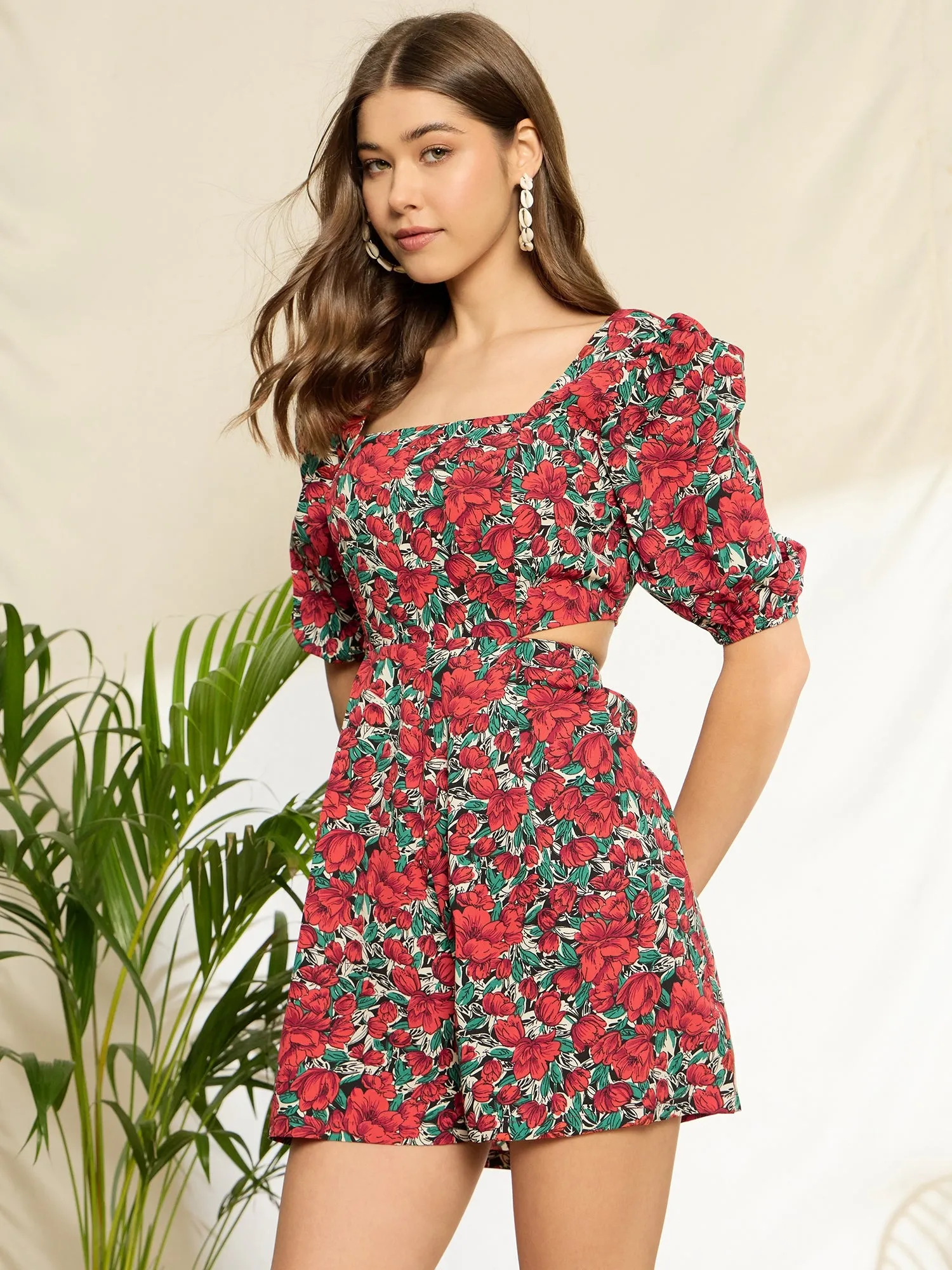 Berrylush Women Red & Green Floral Printed Square Neck Puff Sleeves Waist Cutout Mini Jumpsuit